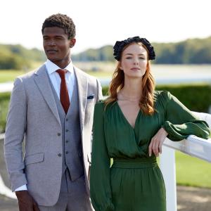 Smartly dressed man and woman at the races